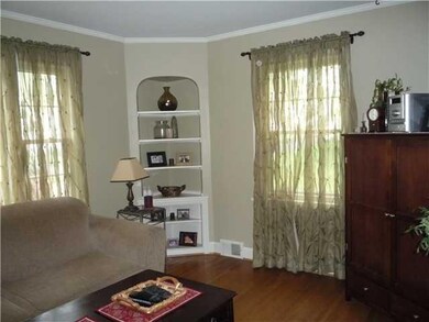 Living Room. The Living Room has hardwood floors, 