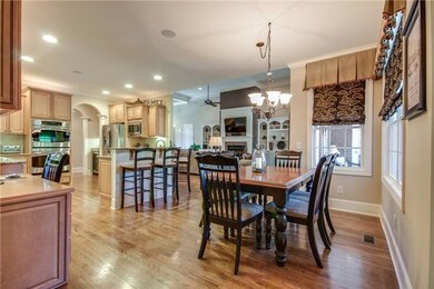 The Breakfast Area completes the open layout of this home and has a wonderful view of the private backyard.