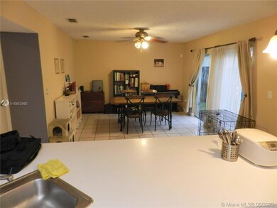 Kitchen opens to family room (per builder plan) - Current owners using space as dining room