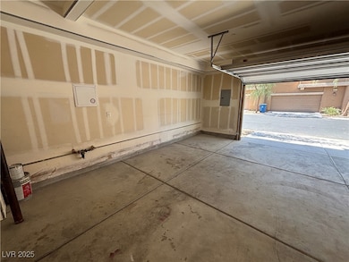 Garage featuring electric panel