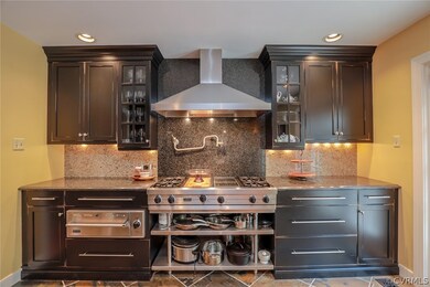 Bar featuring tile flooring, wall chimney exhaust