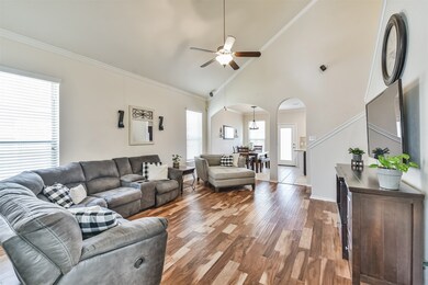 Your new living room has beautiful hard wood floors, vaulted ceilings and natural light.