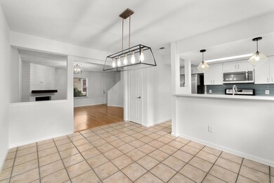 Unfurnished living room with light tile patterned