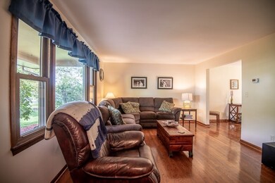 Spacious Living Room with Hardwood Flooring
