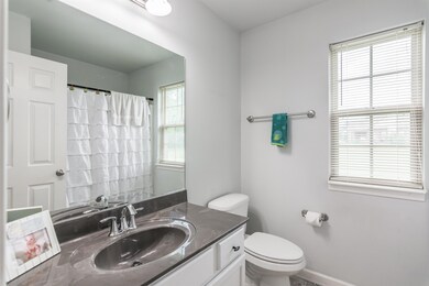 Shared bathroom on kids side of the home (divided living spaces, master suite on other side of home.)