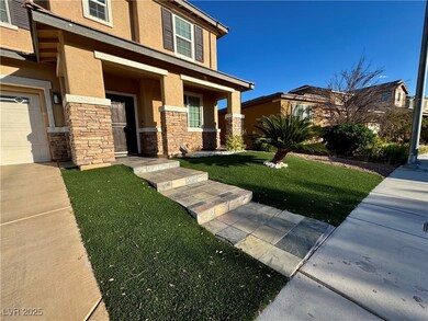View of front of home with a porch, stucco siding,