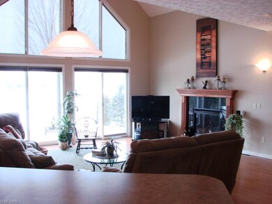 Great room with panoramic views of landscaped back