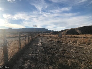 View of street with a view of rural / pastoral area and a mountain view
