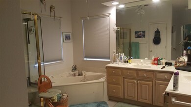 Melt away the day's stress in this jetted spa tub.
