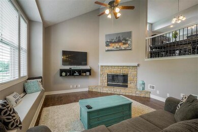 Gorgeous great room with vaulted ceilings, window 