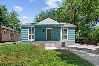 Bungalow featuring a porch and a front yard