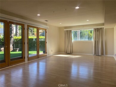 Huge open light bright living room  French doors
