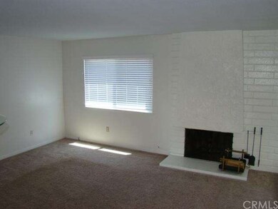 Living room has gas fireplace