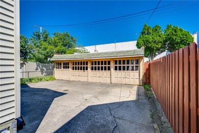 View of 4 bay garage