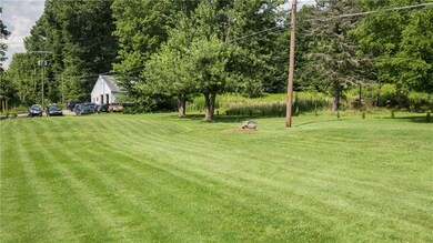 The view of the 2.45 acres with the automotive gar