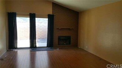 Spacious living room with a slider to the back yar