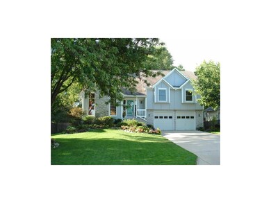 Level driveway to extra spacious garage with tall 
