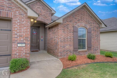 Property entrance with a garage