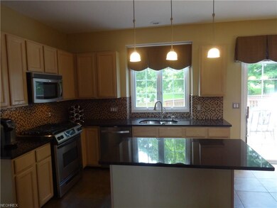 Eat-in kitchen with slider to deck