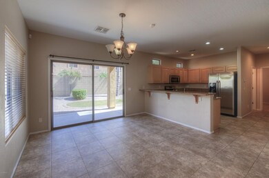 Kithcne and nook with exit to patio