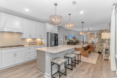 Kitchen featuring appliances with stainless steel 