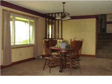 An additional view of the formal dining room from 