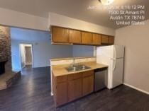 Kitchen with stainless steel dishwasher, freestan