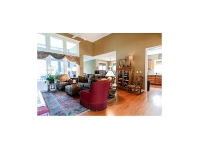 Beautiful open floorplan with lovely hardwood floo