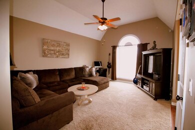 Vaulted ceiling & updated ceiling fan fixture...small closet for storage...