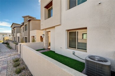 View of side of property featuring stucco siding,