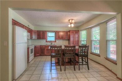 Custom Cabinets, Glass Subway Tile Backsplash, Gra