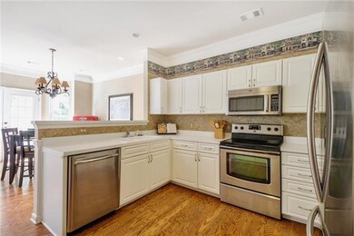 The modern kitchen boasts seemingly endless cabine