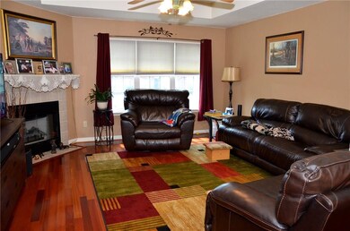 Spacious Living Room. Notice the Brazilian Cherry Hardwood Floors.
