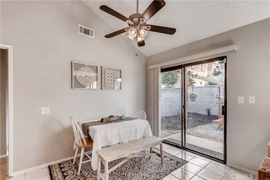 Vaulted ceilings, eat-in kitchen looks out to beautiful backyard!