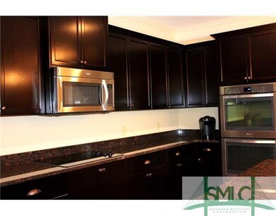 Kitchen. Upgraded double ovens and separate cookto