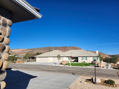 Exterior space featuring a mountain view and driveway