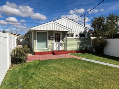 View of front of property featuring a front yard