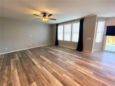 Great room has gorgeous flooring. 