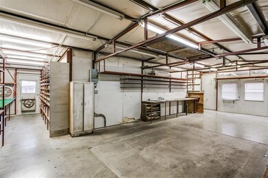 Large workshop with 220 V outlets, A/C, a bathroom