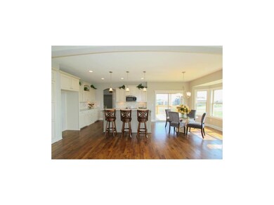 KITCHEN AREA WITH LIGHTER KITCHEN CABINETS-ISLAND 