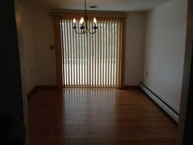 Dining Room. Nice large dining room has hardwood f