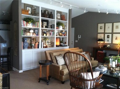 Living Room: This grand built in bookcase adds sophistication as well as storage.