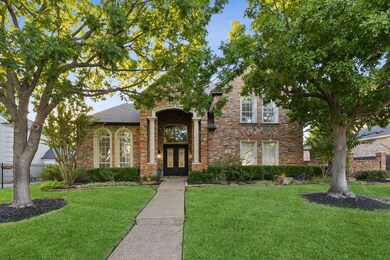 View of front of house with a front yard