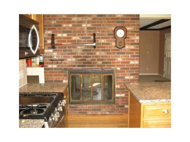 Kitchen. Double fireplace in kitchen area!