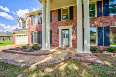 View of front of home with a garage