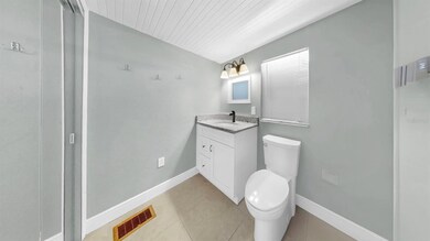 1/2 bath with laundry in closet
