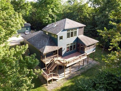 More Decks with Covered Porch off Master Suite.