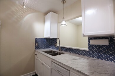 ANOTHER PICTURE OF THE KITCHEN WITH GOOD COUNTER S
