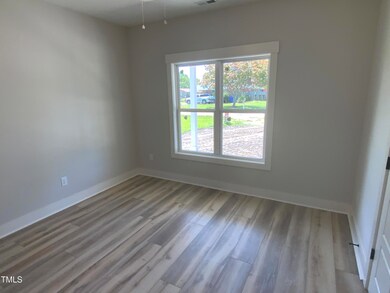 221 E Jackson St, Coats, NC 27521 - photo 5