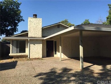 Front of Unit A, with Unit A's carport